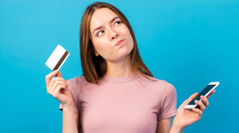 Credit cards fanned out showing balance transfer offers and 0% APR promotional rates