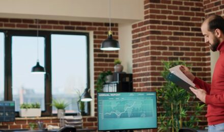 Dashboard showing AI-powered cash flow forecast with daily cash position and transaction patterns for small business