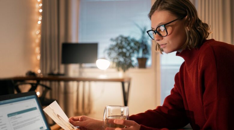 A person using a fintech app to track side hustle income with multiple income streams