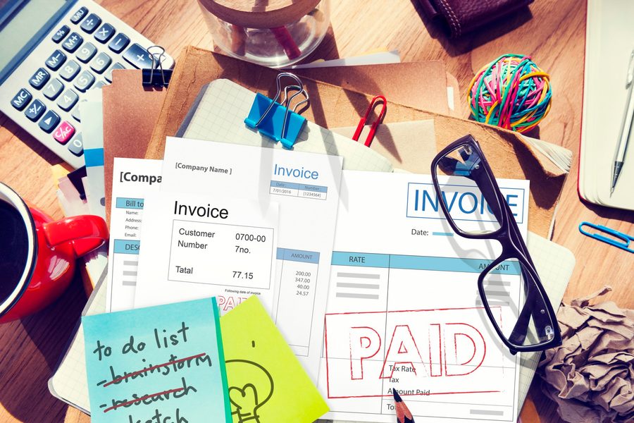Smartphone app showing invoice factoring approval notification with funding amount