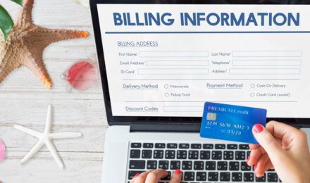 Person on phone negotiating bills with service provider to reduce monthly costs
