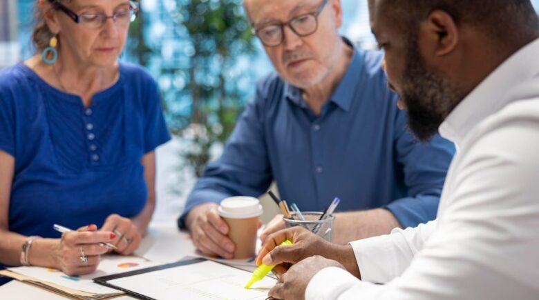 Oregon retirees reviewing long-term care costs and HSA withdrawal strategy documents