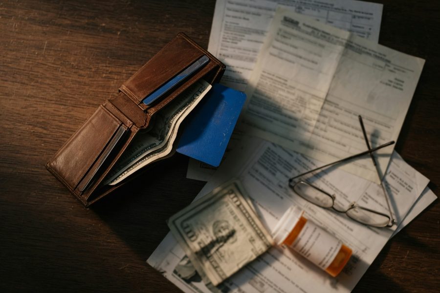Monthly healthcare costs for early retirees before Medicare, showing premium, deductible, and out-of-pocket maximum.