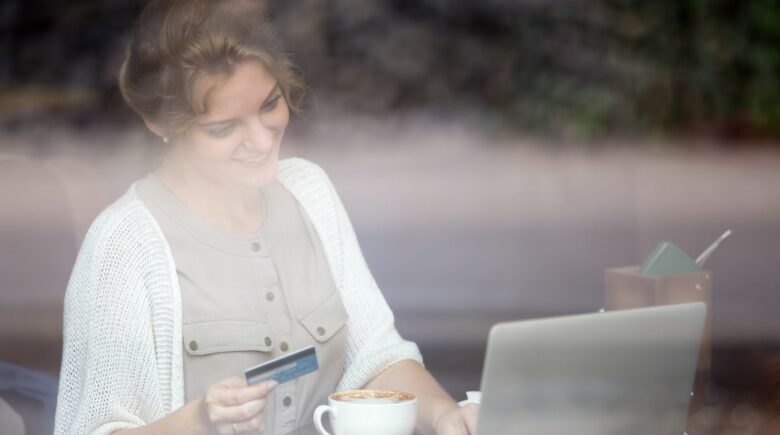 Young adults using fintech apps on smartphone to build emergency savings in Texas and Florida
